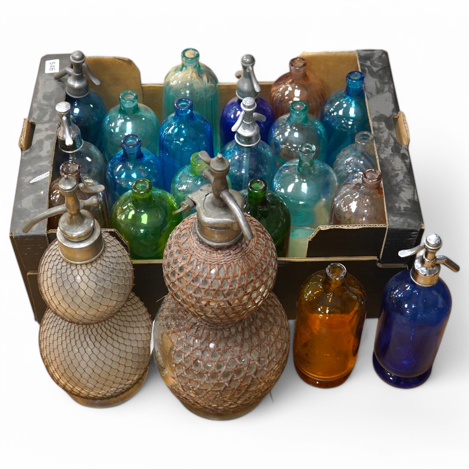 An Edwardian Standard English Seltzogenes double gourd Soda Syphon, one other and a collection of coloured glass bottles. Condition - varies